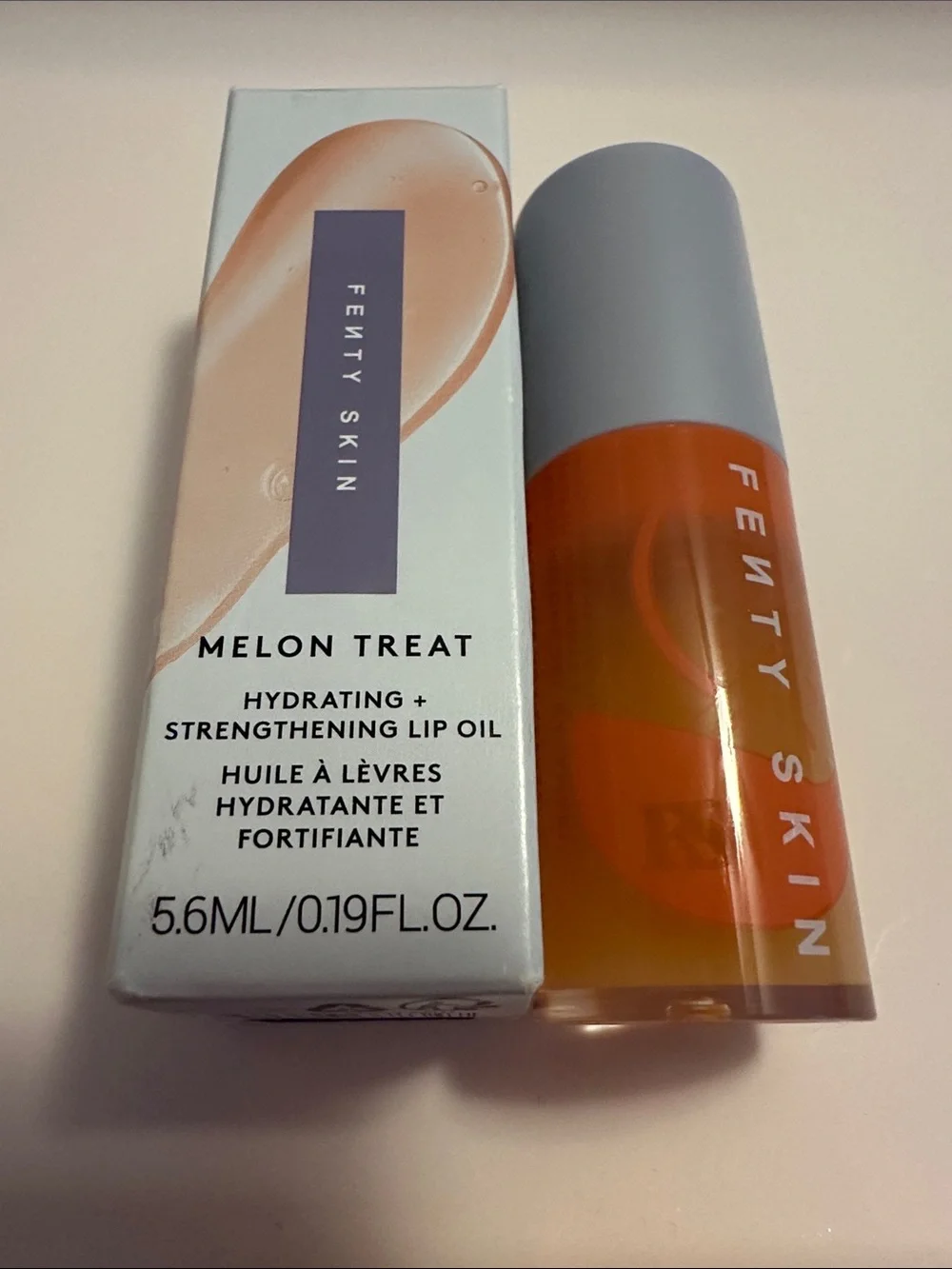 Fenty Beauty Hydrating + Strengthening Lip Oil Kalahari Melon